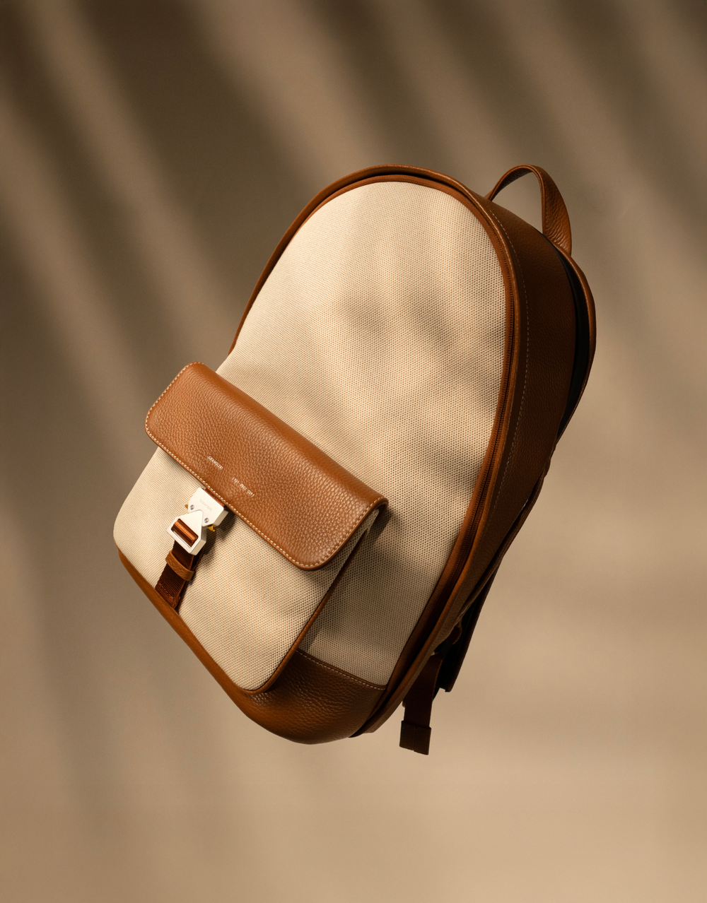 La Siesta canvas and brown leather backpack
