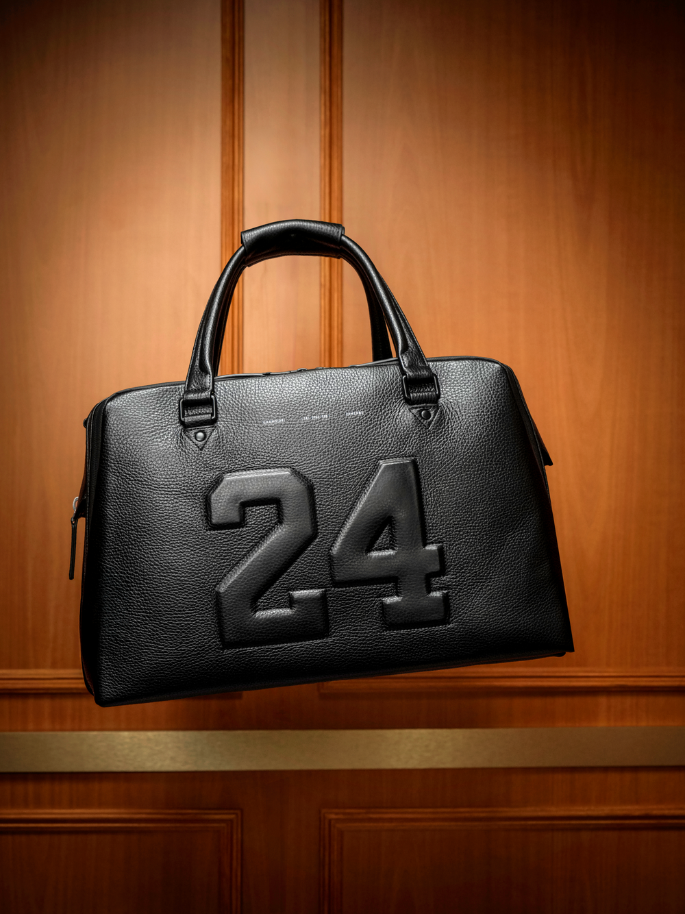 24HERBS x GRAMS28 black leather duffle with 24 embossing